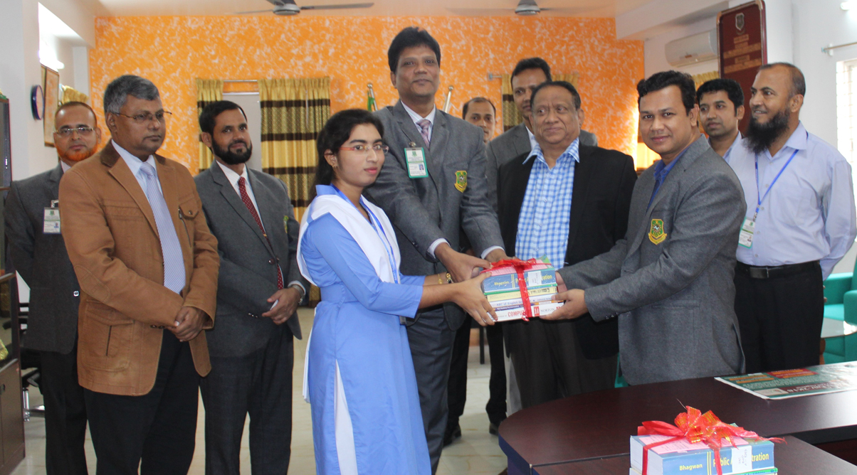 Distribution of books among the newly admitted students - Department of ...